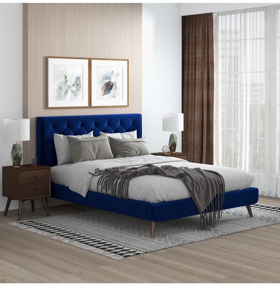 Dillon Luxe Velvet Bed front view styled with pillows and throw