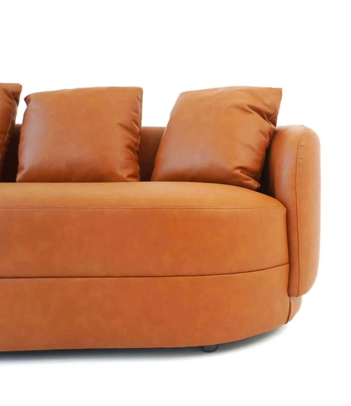 The Siena cognac curved sofa - front view on white background