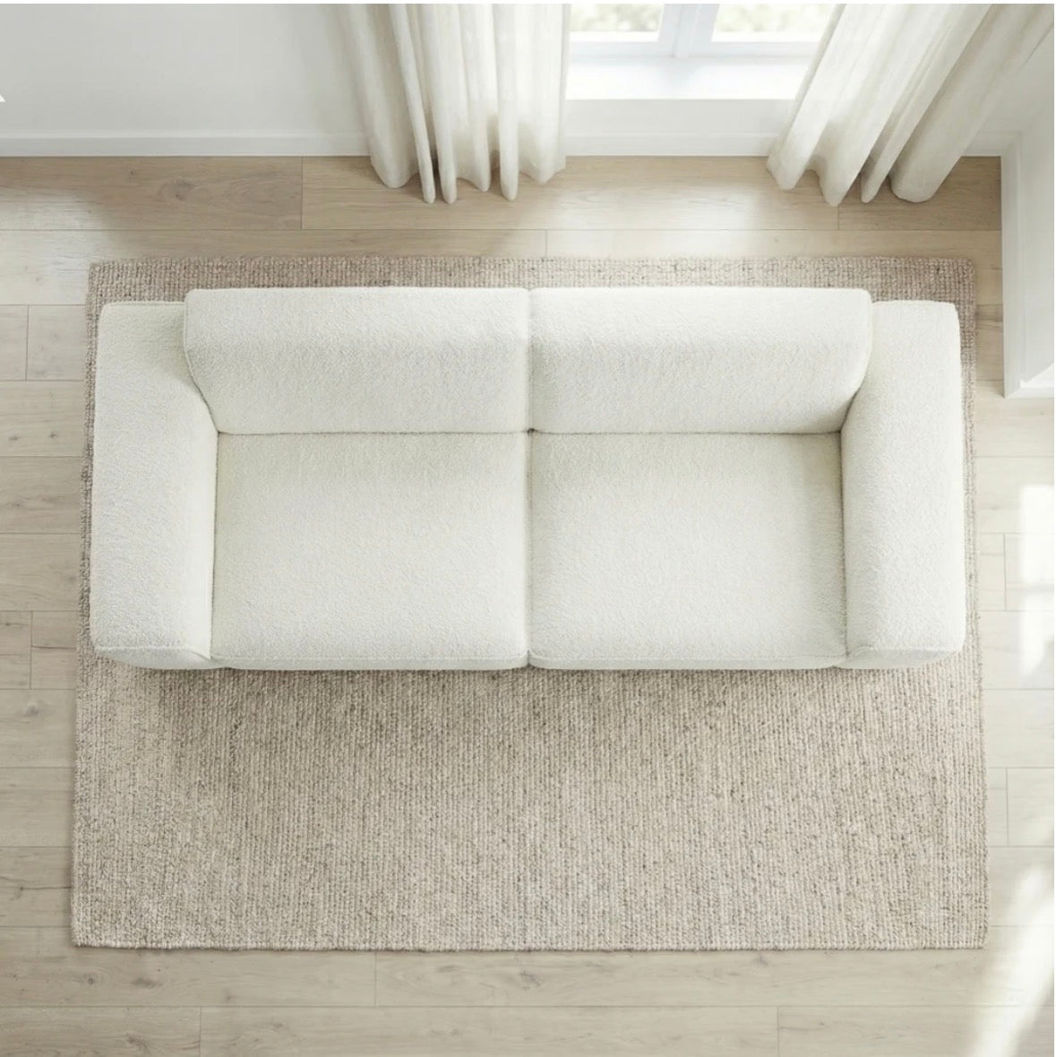 The Aspen sofa overhead view on natural rug