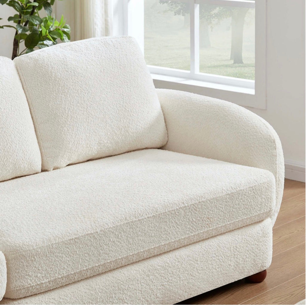 The Marlowe bouclé sofa – full front view in living room setting