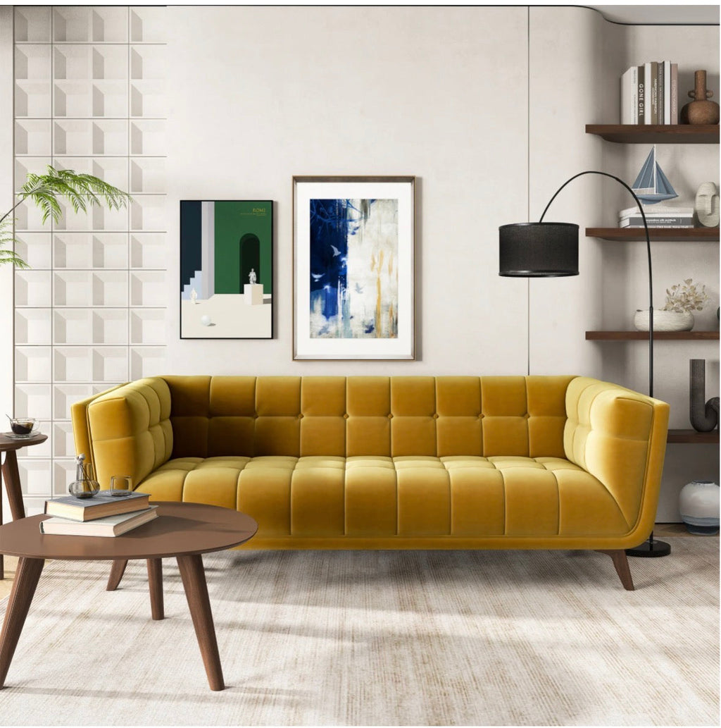 The Aurelia gold velvet sofa - front angle view