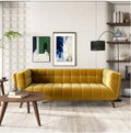 The Aurelia gold velvet sofa - front angle view
