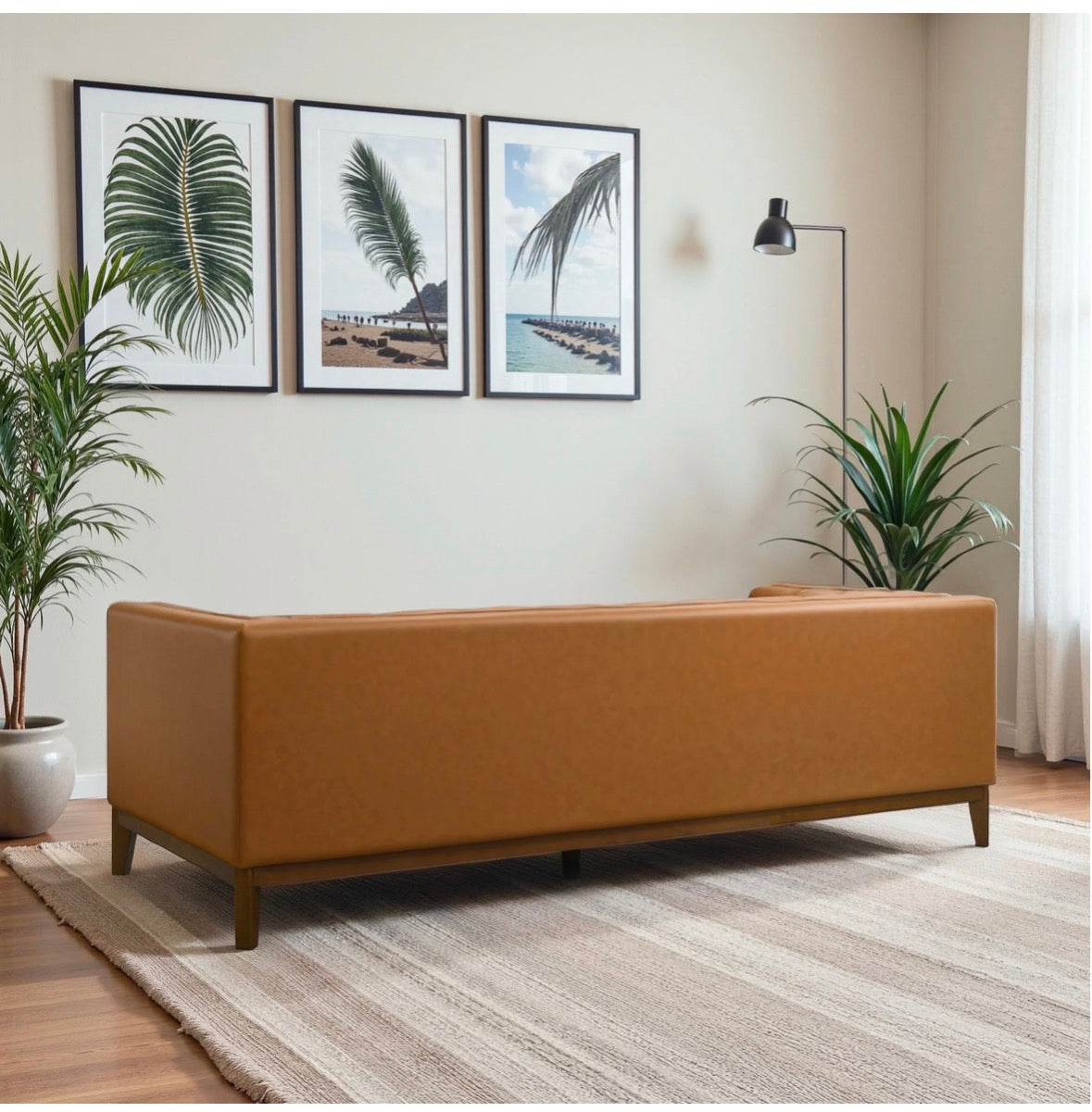 Madison Cognac Vegan Leather Sofa - close-up of walnut leg detail