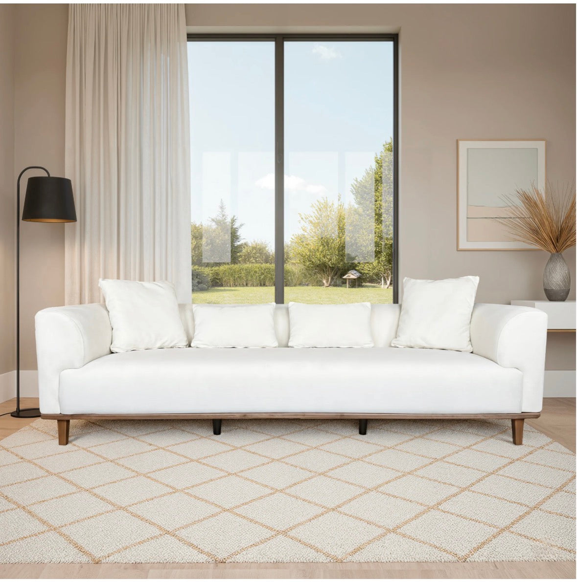 Claire Cream Velvet Sofa - front view in bright living room