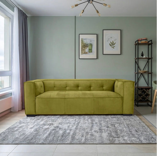 Harper Olive Velvet Sofa - front view in styled living room