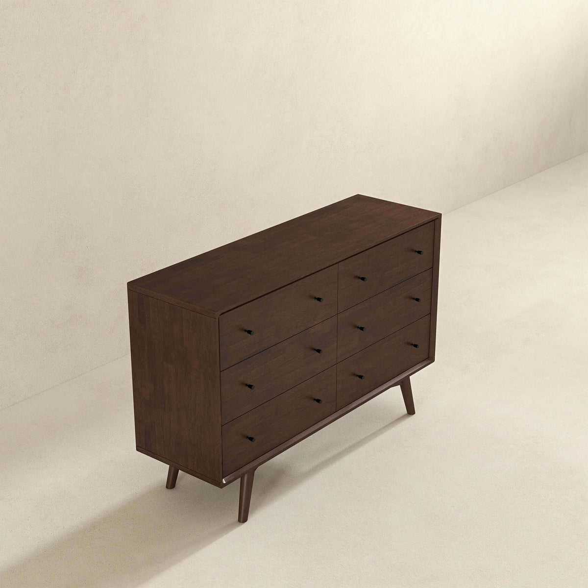 Angled view of The Amara six-drawer walnut dresser